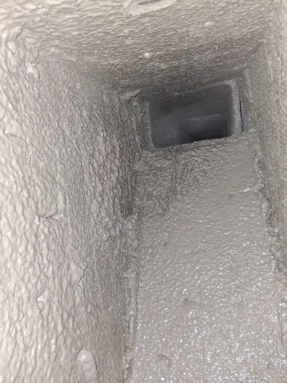 Smoke Chamber Repair in Dedham, MA — Parged flue opening