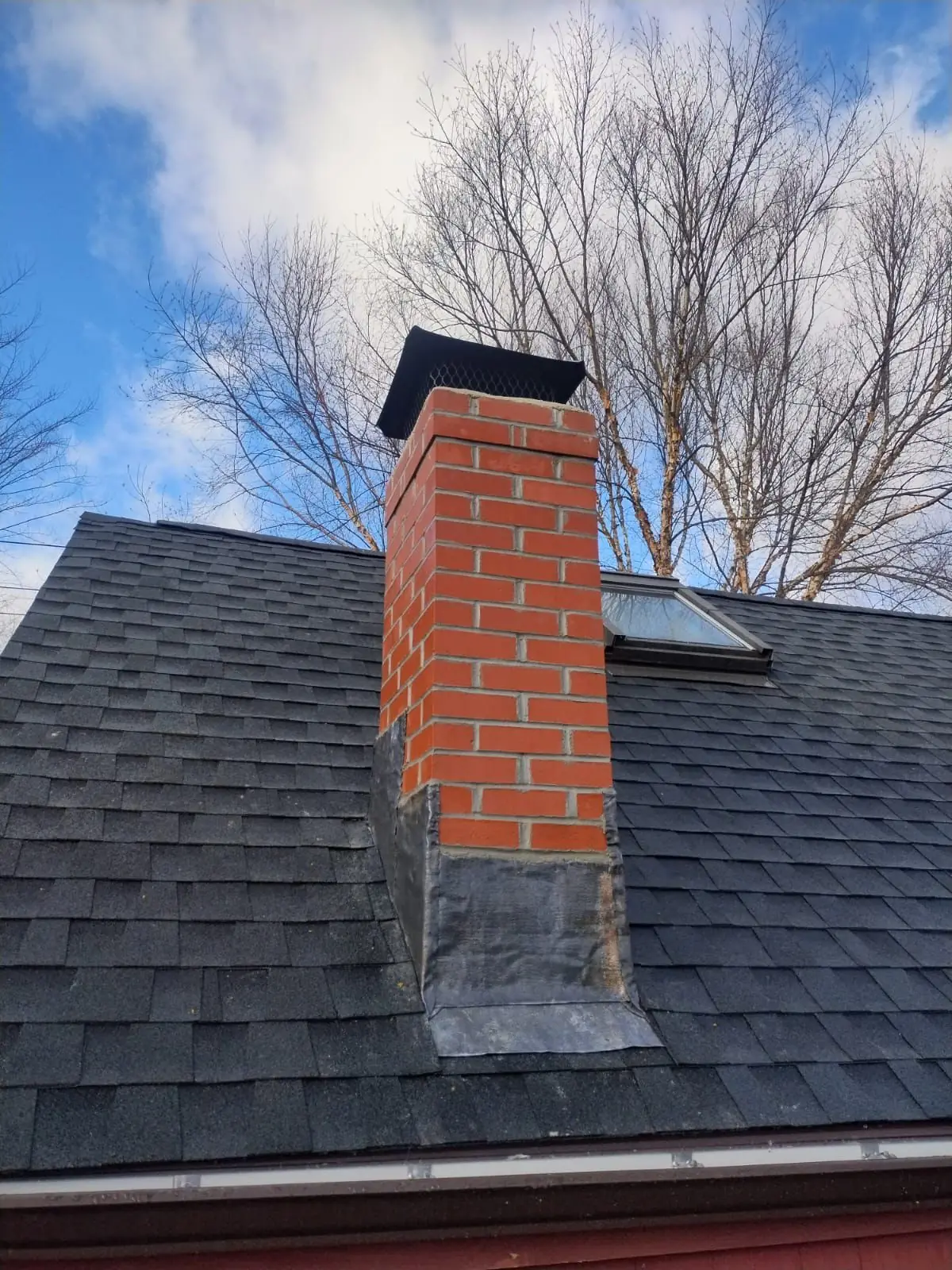 Finished brick chimney rebuild with new flashing