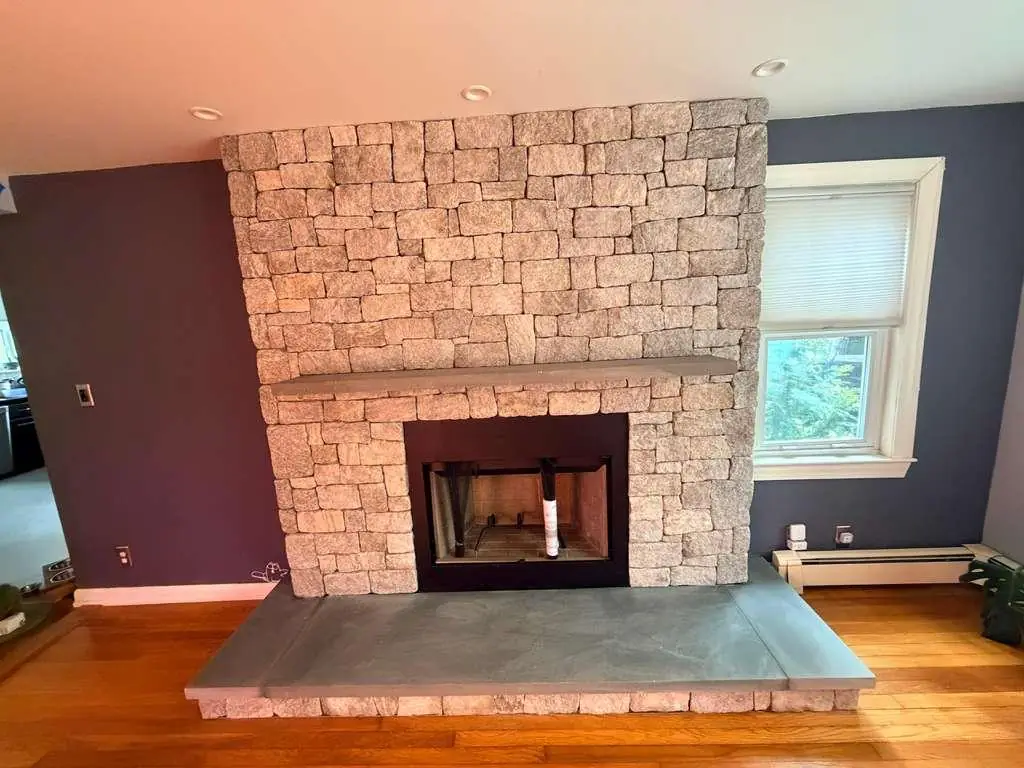 Finished interior natural stone fireplace rebuild