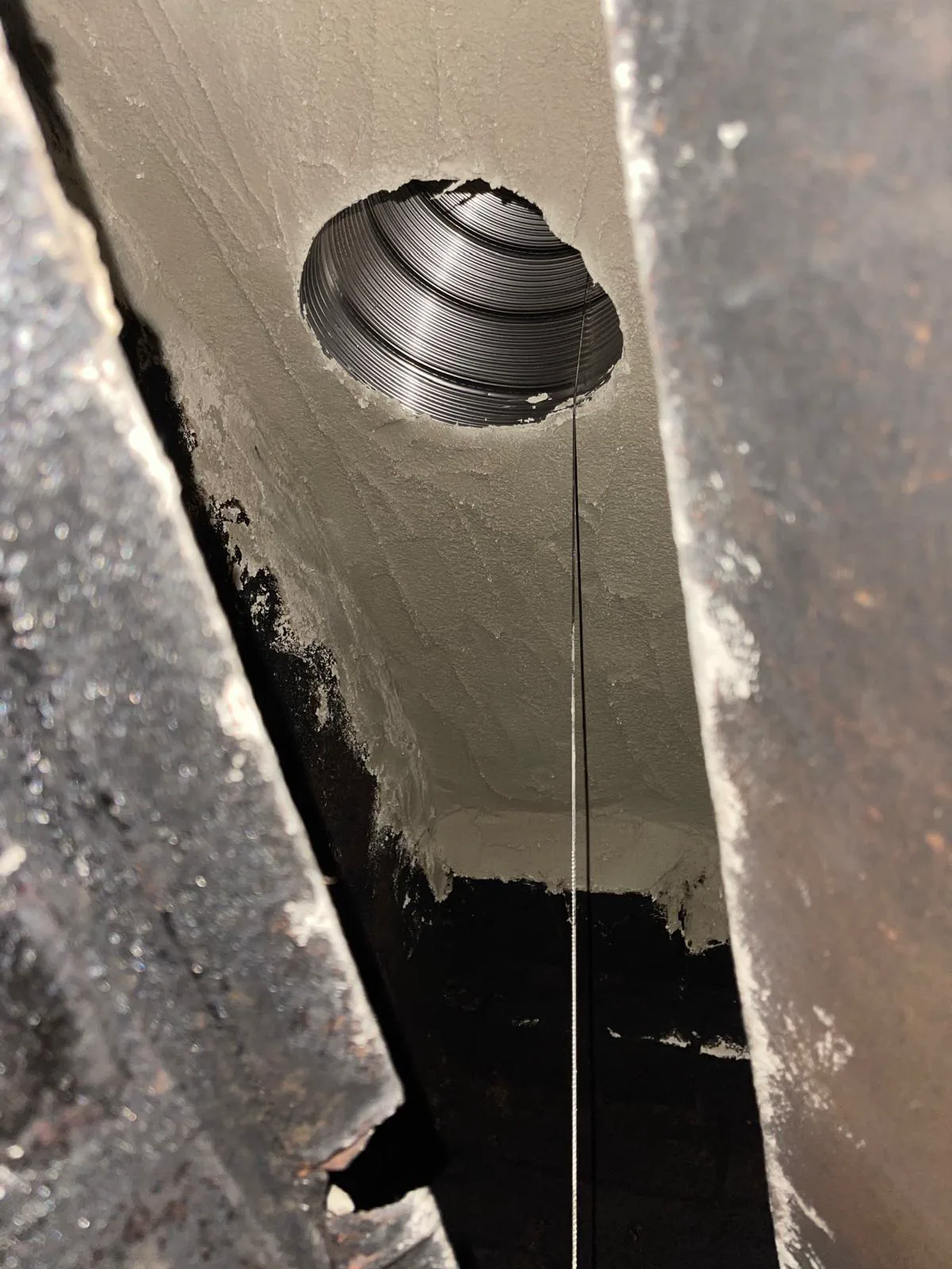 Smoke chamber parged smooth with a new liner connection
