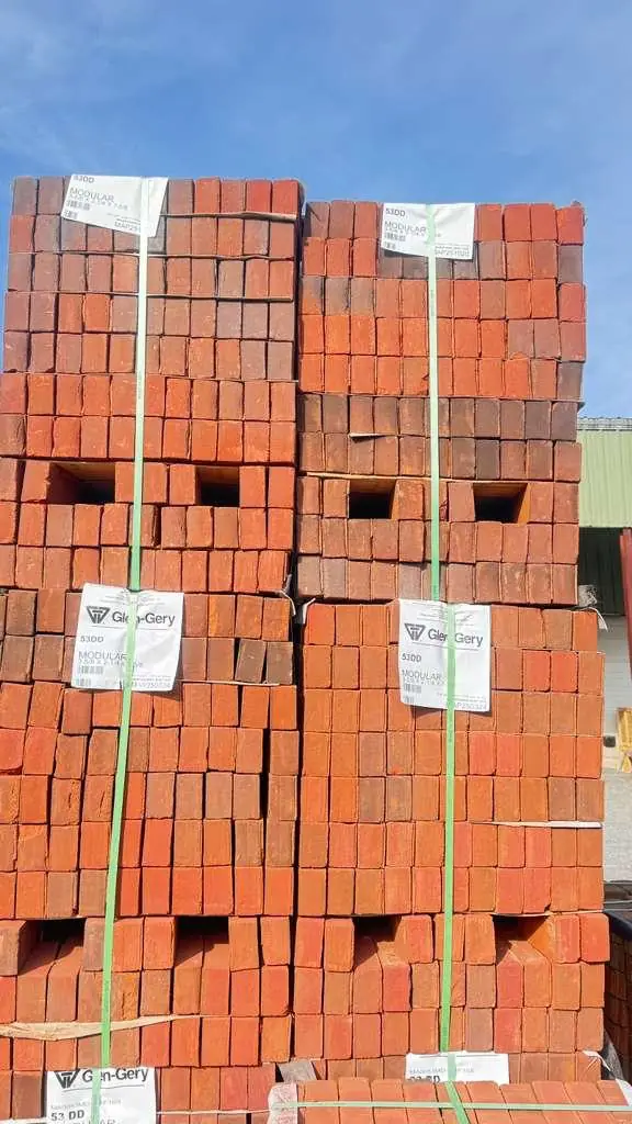 New Glen-Gery modular brick stacked at a Quincy masonry repair jobsite