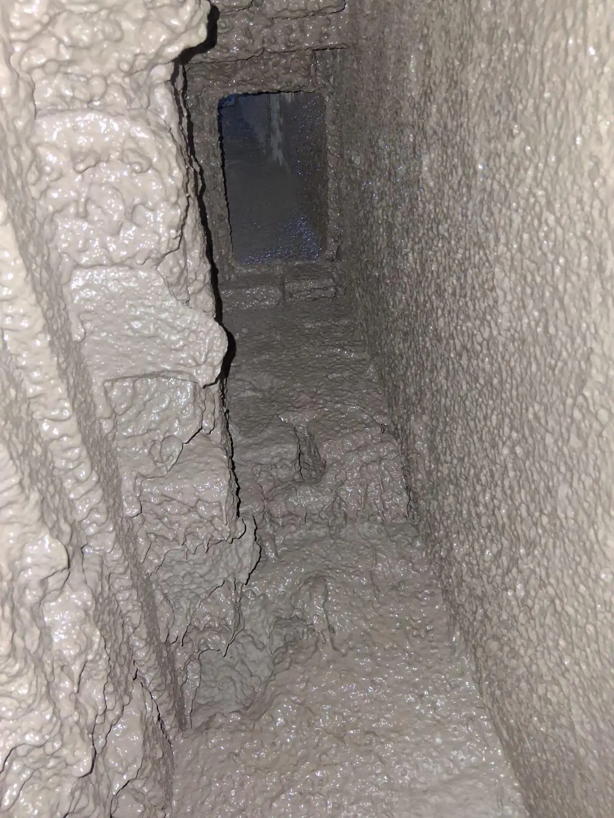 Close-up of smoke chamber parging detail in a South Shore home